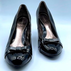 Faux black patent leather bow toe pumps